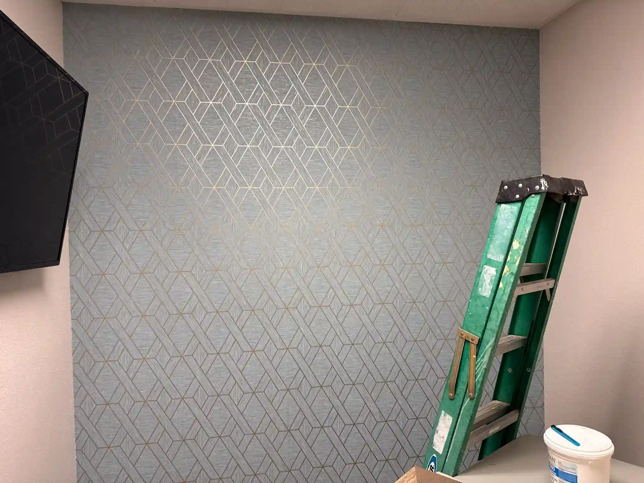 Historic home interior with carefully restored wallpaper