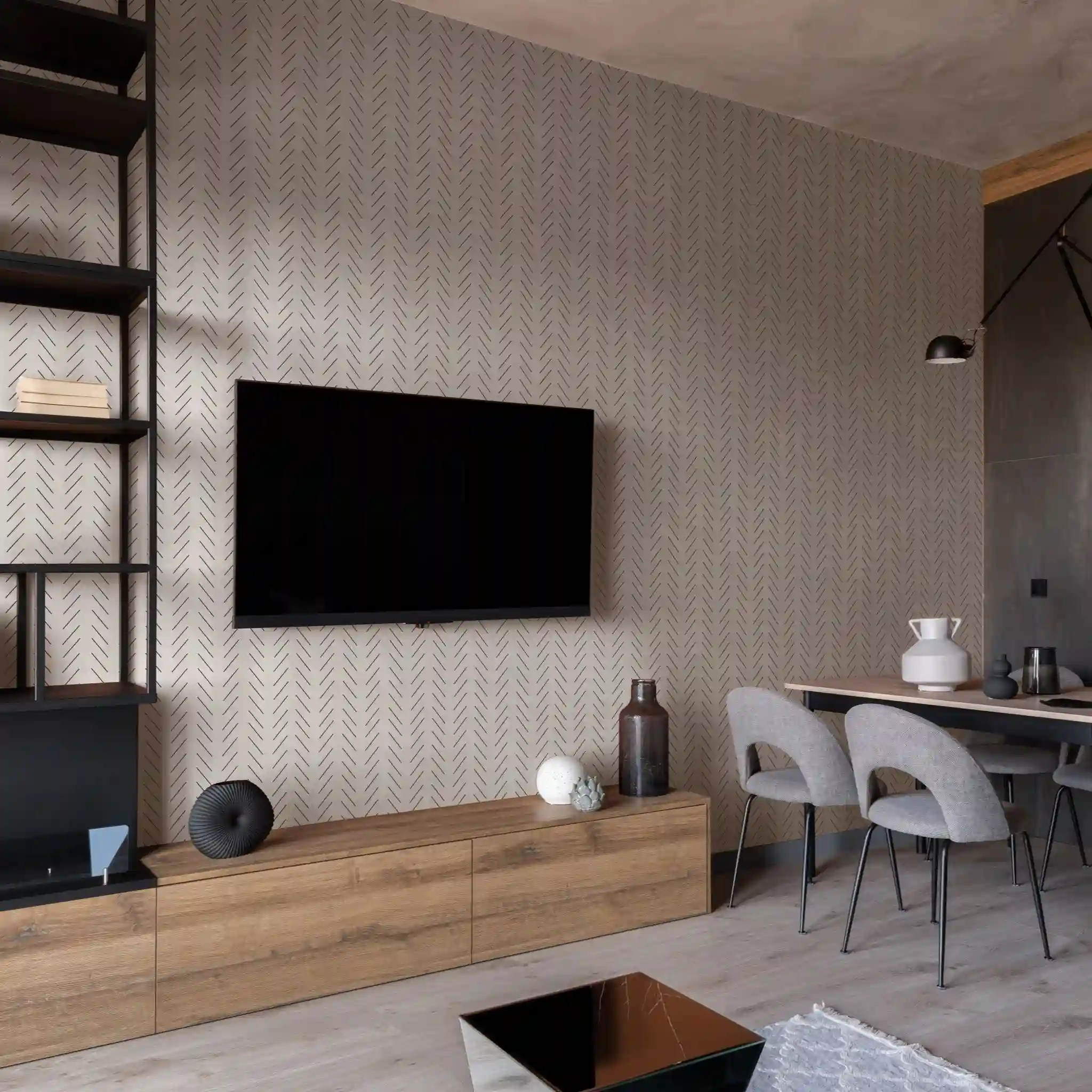Professional wallpaper removal in progress without damaging drywall